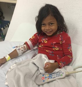 Bhanu in a hospital bed at Children's Minnesota