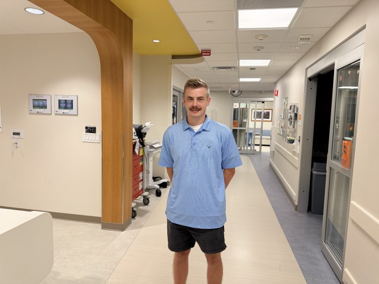 Luke Bonte in a hallway at Children's Minnesota.