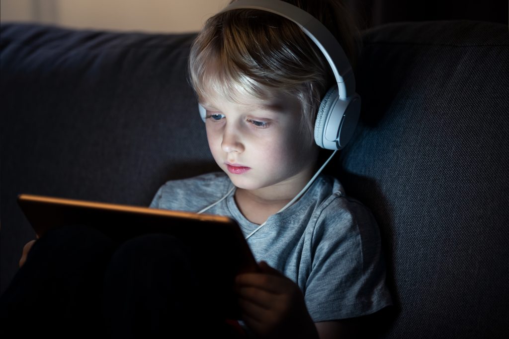 Little boy using tablet computer