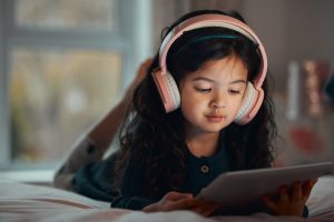 Little girl using an iPad