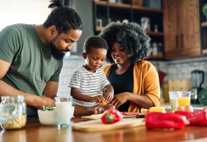 Family making dinner together.