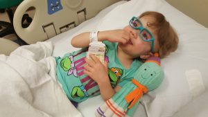 Sloan in hospital bed