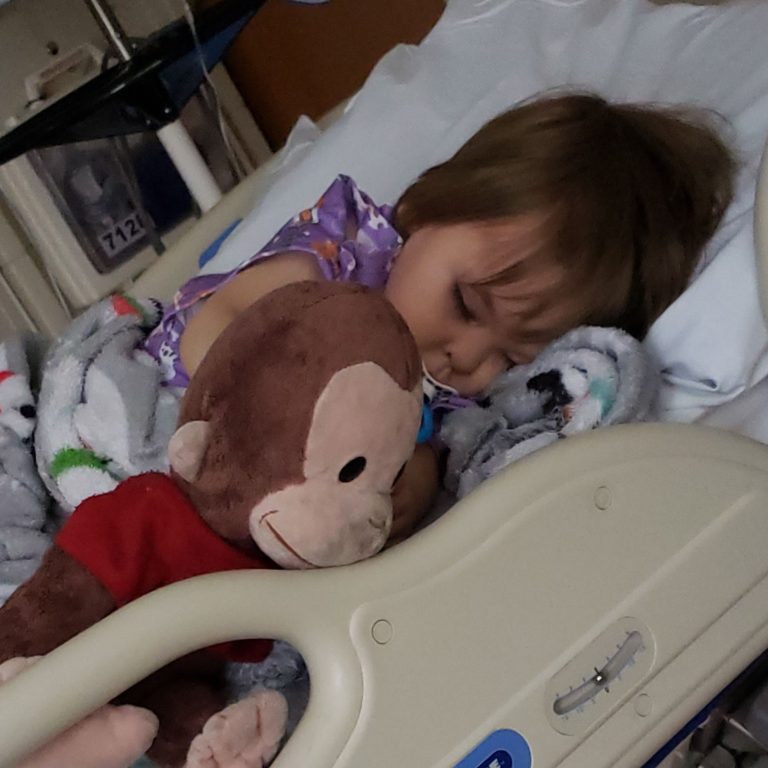 Diario, nickname Junior, lying in his hospital bed at Children's Minnesota.