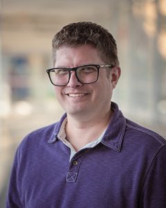 Headshot of Justin Nelson-Deering