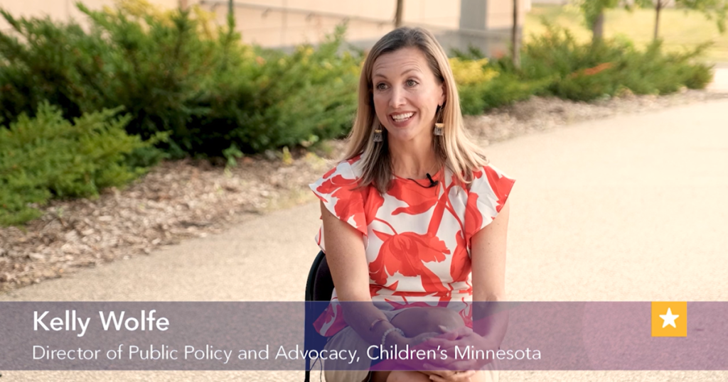 Kelly Wolfe, director or public policy and advocacy at Children’s Minnesota, talking outside to Dr. Marc Gorelick