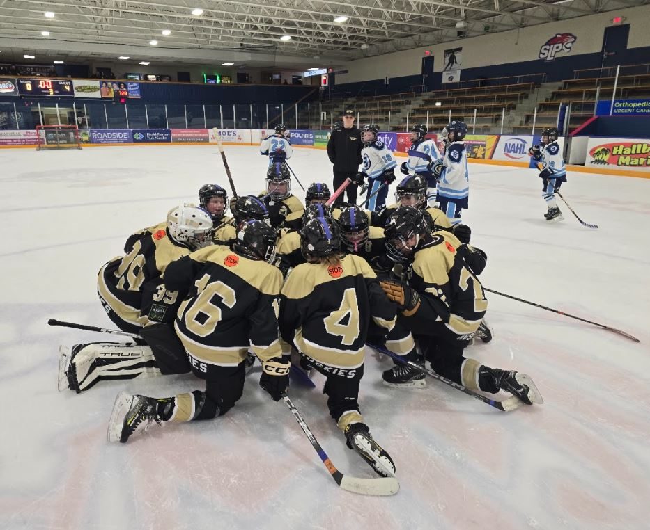 Landon's hockey team gathers.