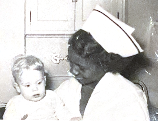 Lois Young, RN with a young patient at Children's Hospital of St. Paul.