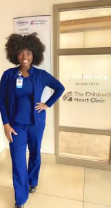 Photo of Lourdmy Jean, RN, The Children’s Heart Clinic, in scrubs