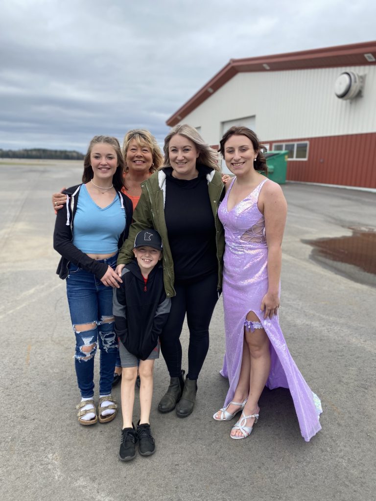 Ashley with her three children and mother, Marcy.