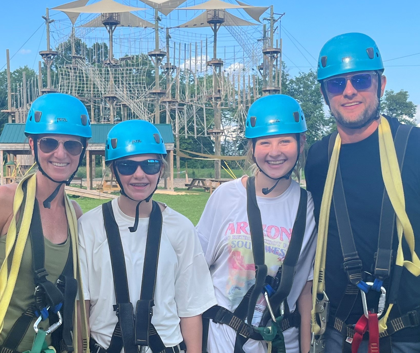 Matt and his family on a obstacle course