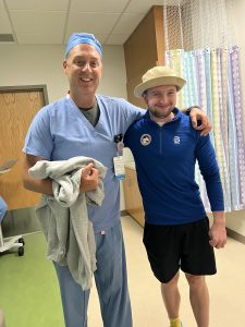 Max and Kyle Halvorson, MD, pose for a picture.