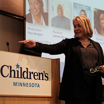 A woman speaking at the Diversity, equity and inclusion (DEI) leaders and champions from throughout the Twin Cities joined Children’s Minnesota and 3M on Jan. 23 for the DEI Collective: Our Twin Cities Diversity, Equity, and Inclusion and Employee Resource Group/Network Partnership. A woman speaking at the Diversity, equity and inclusion (DEI) leaders and champions from throughout the Twin Cities joined Children’s Minnesota and 3M on Jan. 23 for the DEI Collective: Our Twin Cities Diversity, Equity, and Inclusion and Employee Resource Group/Network Partnership.