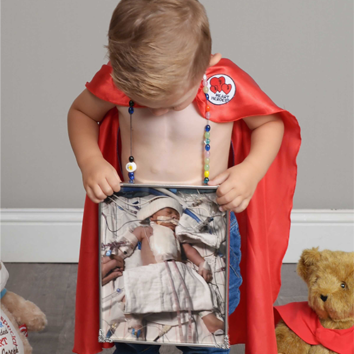 Kashton holding a picture of himself