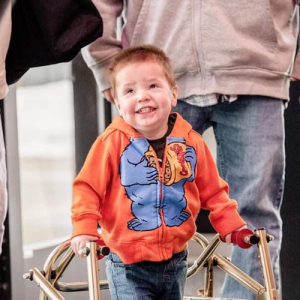 Daniel using a walker