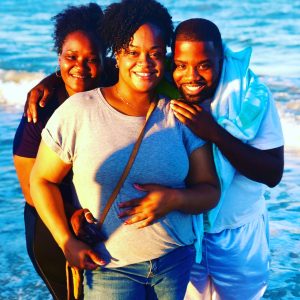 Jasmine, Mike and Kairo's God mom at the beach