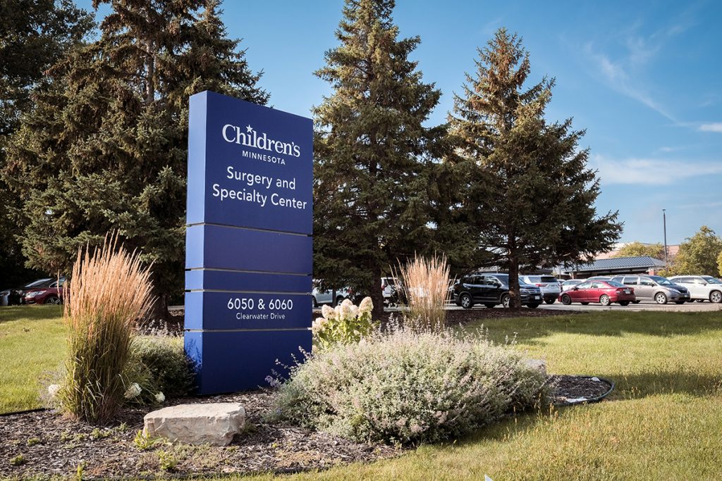 Children's Minnesota Surgery and Specialty Center sign in a landscaped area