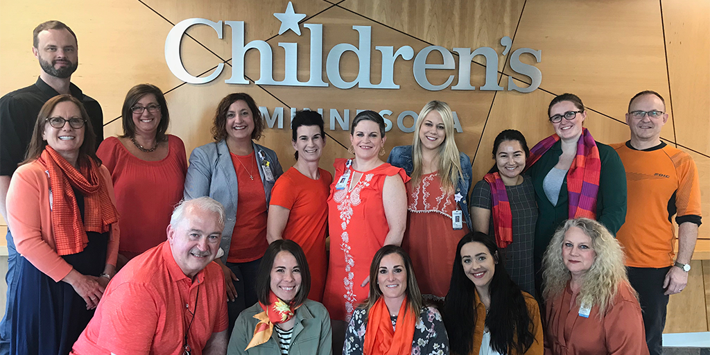 Children's Minnesota employees wearing orange