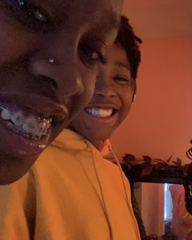 Naz and his mom taking a selfie smiling.