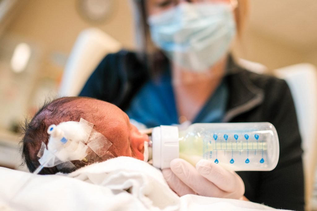 Neonatal baby with bottle