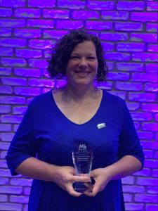 Nicole Hart with award