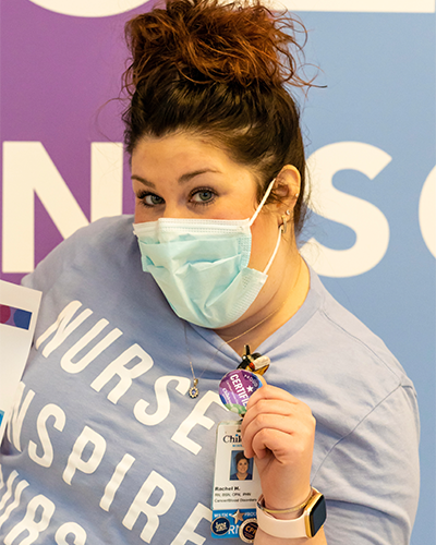 Children's Minnesota nurse wearing a certified nurse button