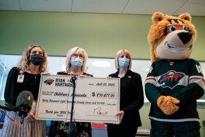 Jenny Soderholm holding check