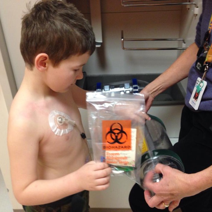 Axel sending his blood sample down.