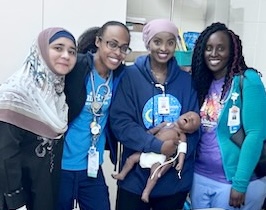 Shukri Jamale with other MERG employees