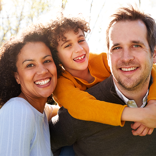 Mixed race family outside in the fall. Mixed race family outside in the fall.