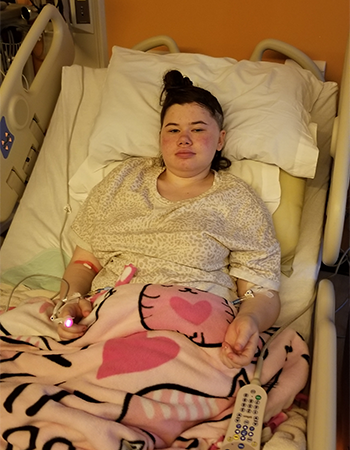 Skyler Johnson at Children's Minnesota hospital in bed