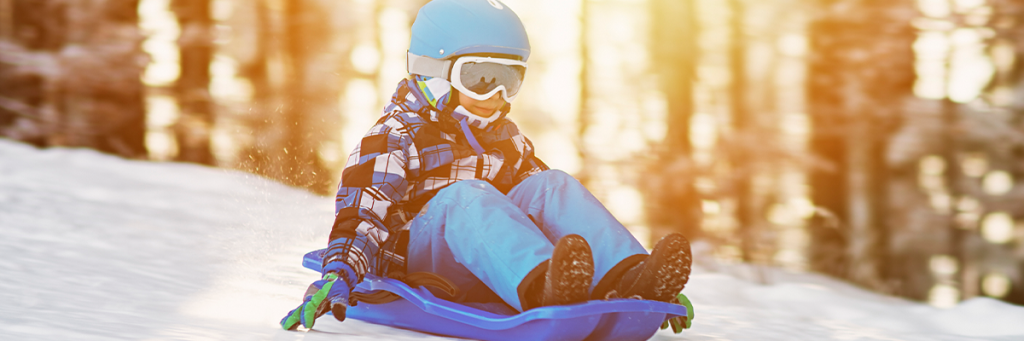 boy sledding