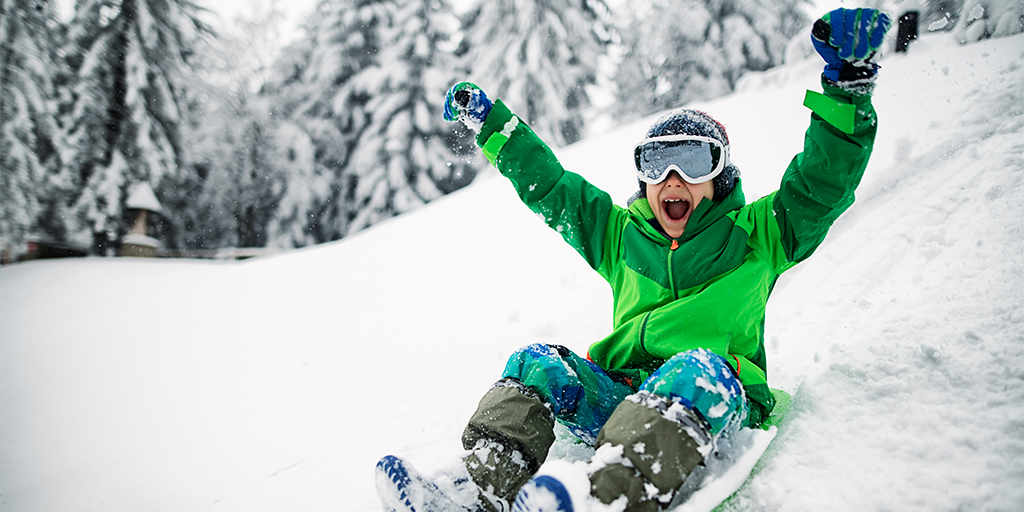 boy sledding