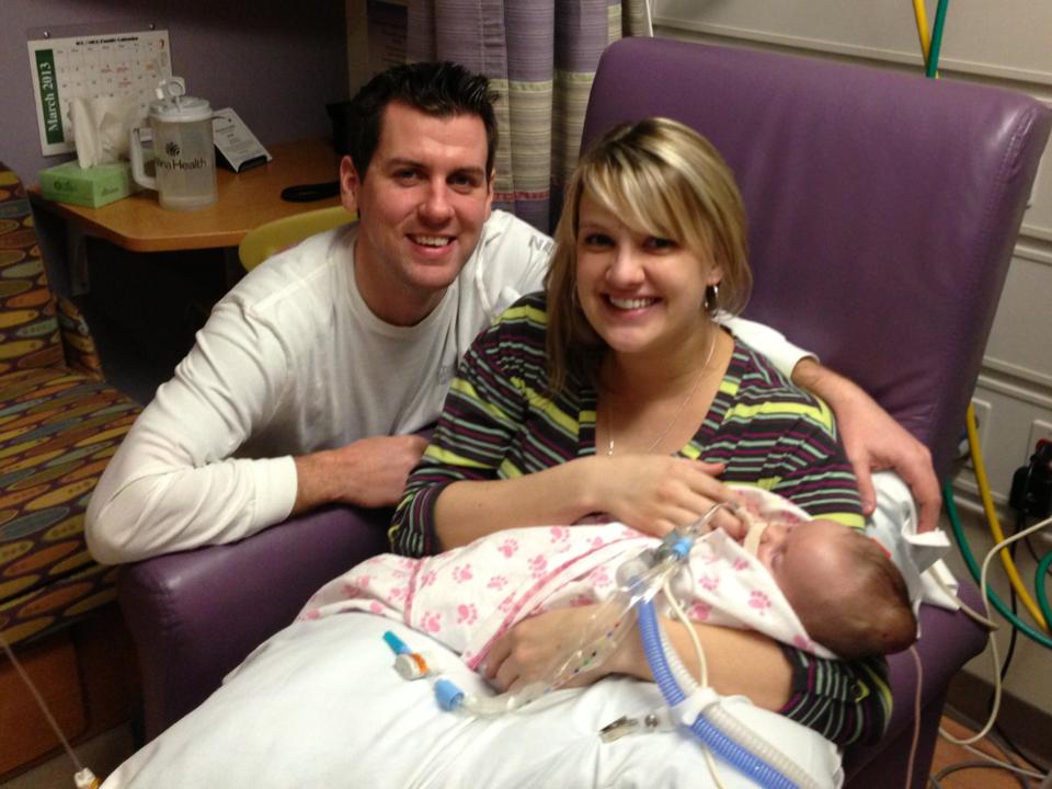 Stella and parents in NICU