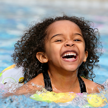 little girl swimming