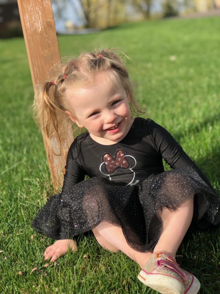 Sydney at her 3rd birthday party in a black dress