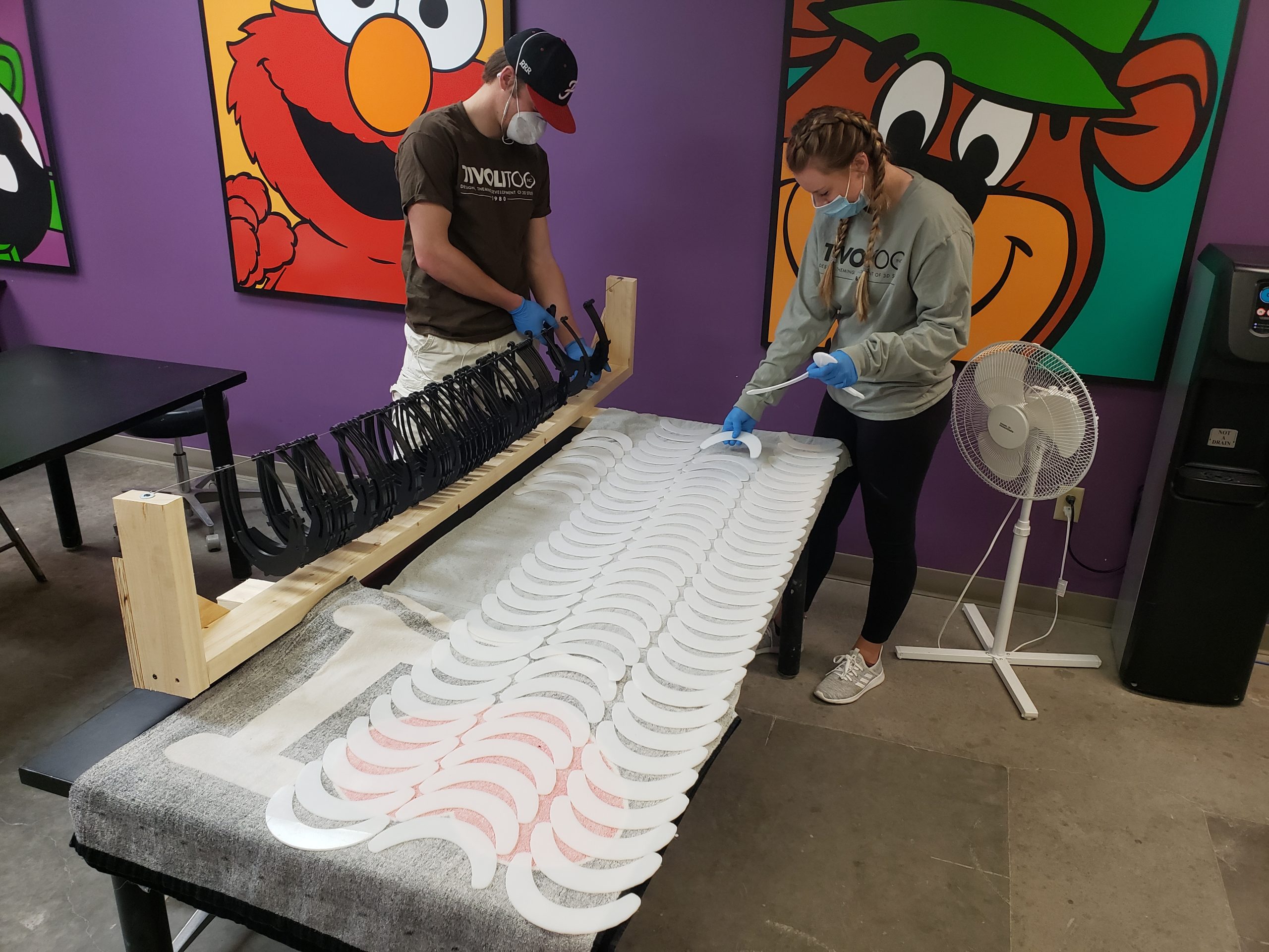 TivoliToo employees making face shields for Children's Minnesota