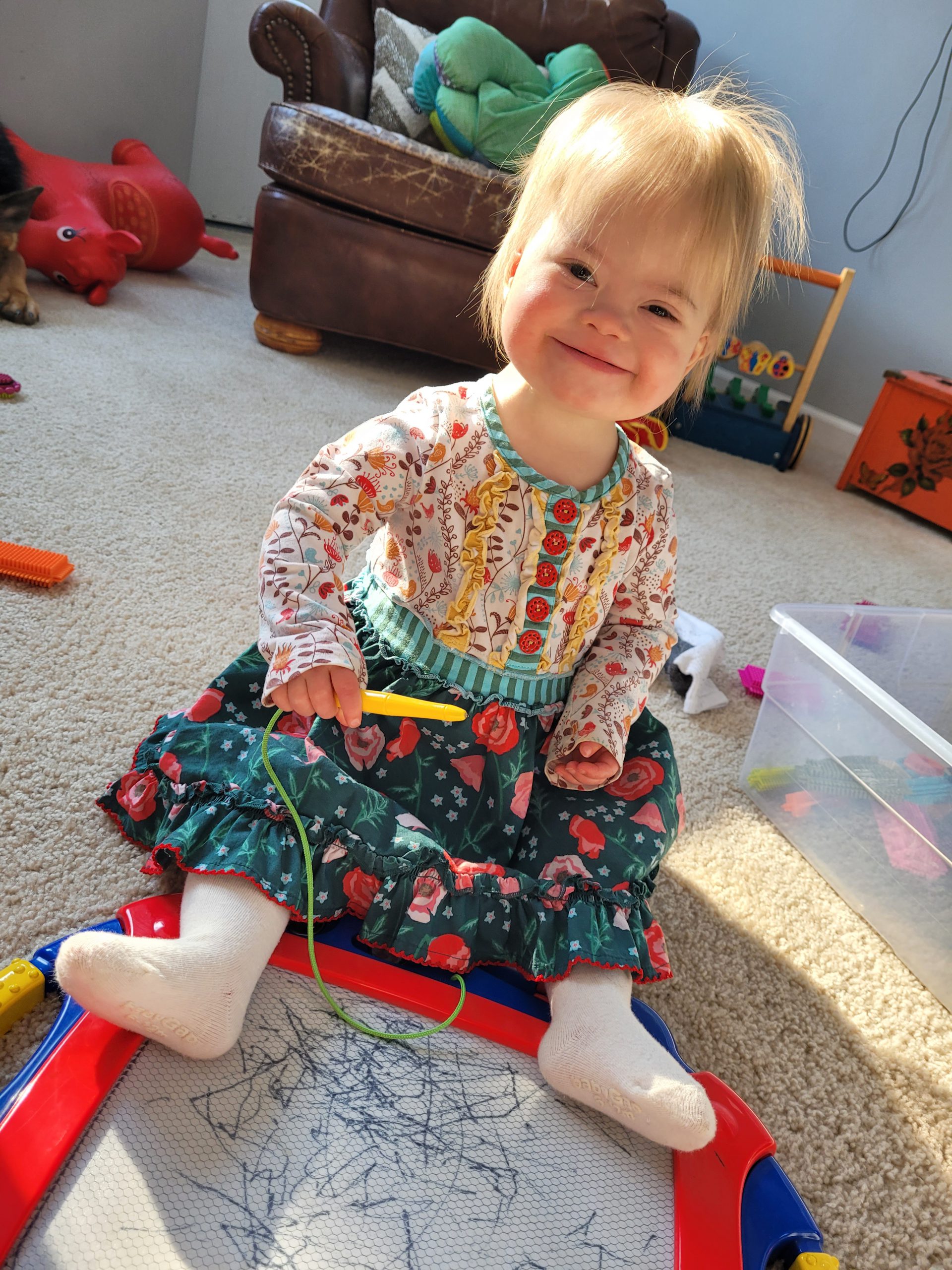 Tallulah playing on the ground