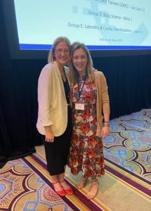 Tami Vance, LICSW, and Dr. Anne Griffiths, medical director of the PCD Clinic, at a conference.