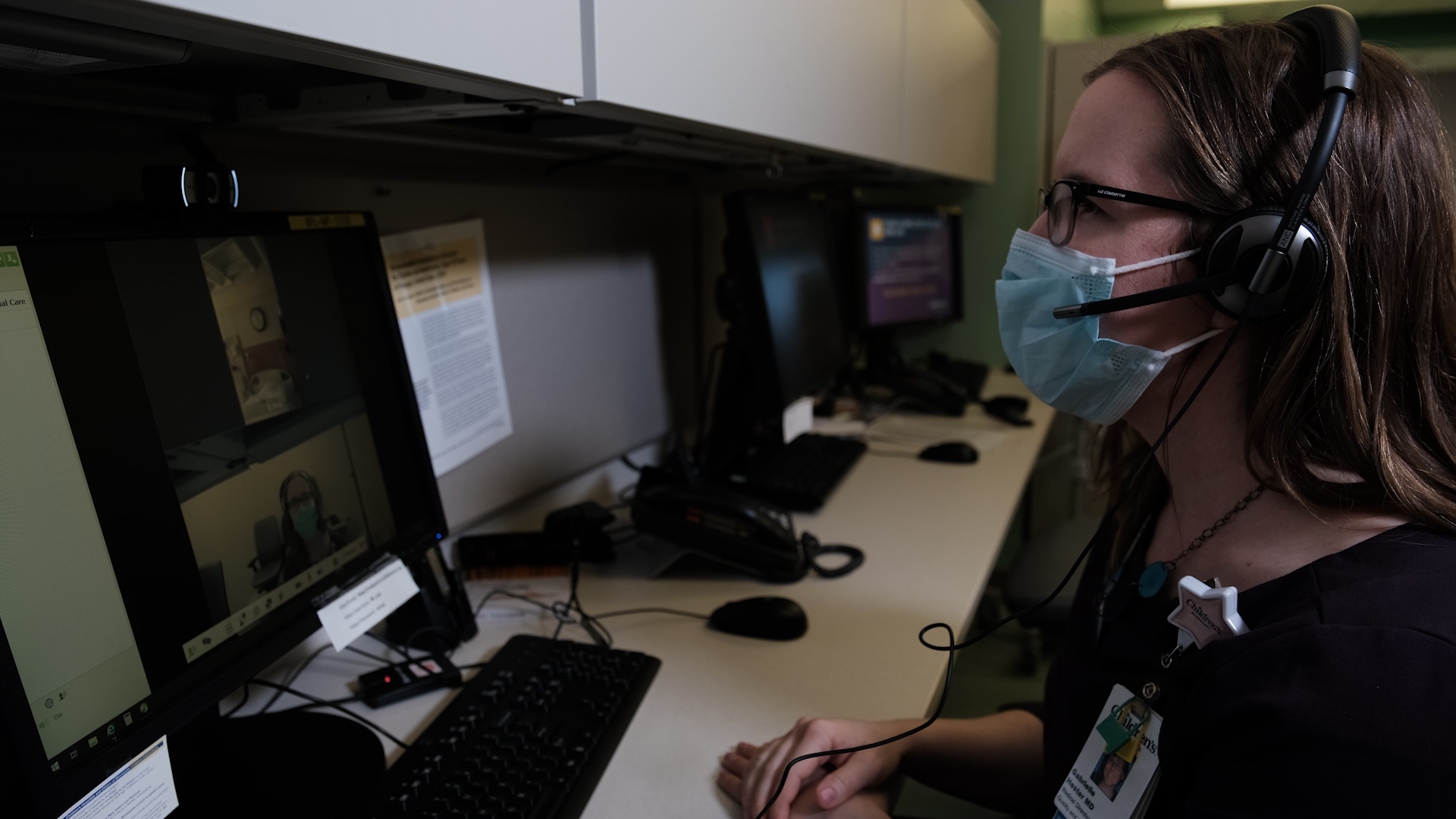 Dr. Gabby Hester on a computer during a virtual care visit.