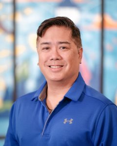 Headshot of Allen Malicsi, senior equity and inclusion consultant