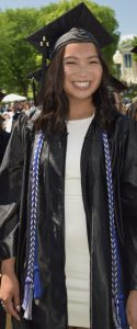 Ellie wearing her cap and gown for graduation