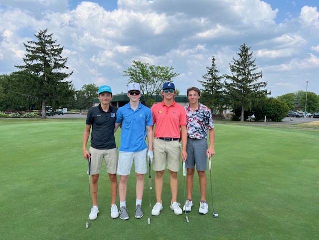 Jordy and his friends standing together at a golf tournament. Left to to right: Tommy Lewin, Joey Mugaas, Rylan Schultz and Jordy.