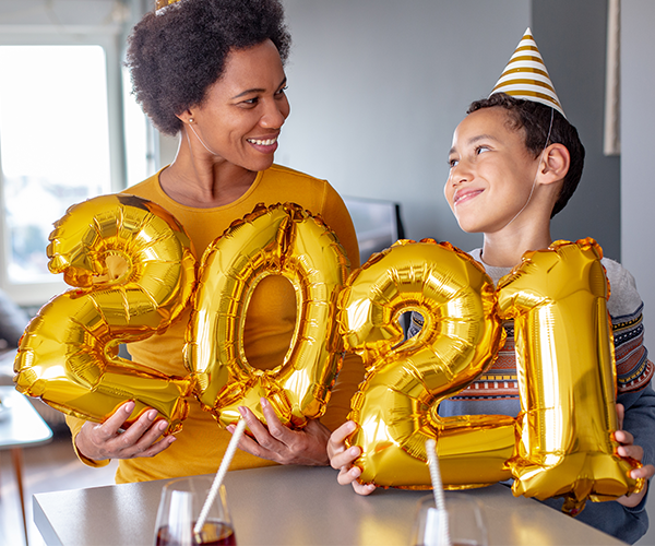 Mom and son celebrating new year at home