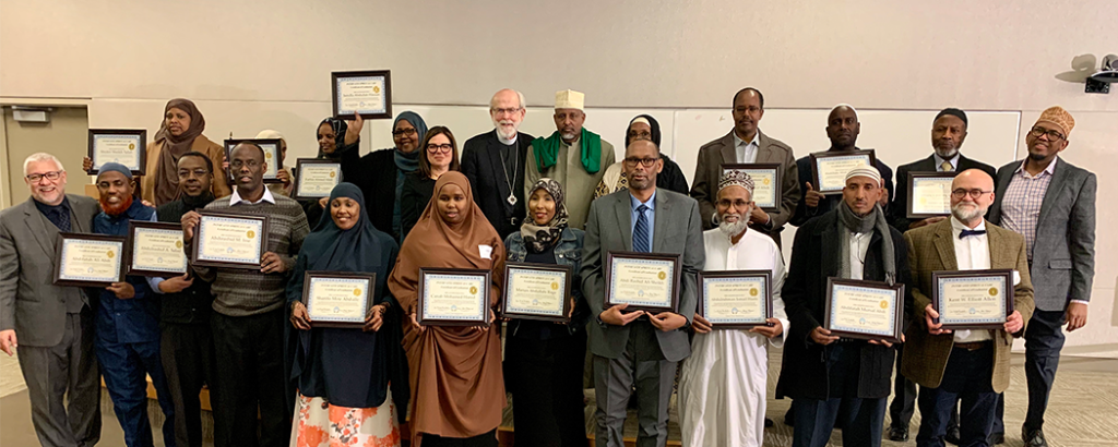 Twenty-one Muslim faith leaders who graduated from spiritual care program