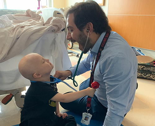 Oliver in the hospital with Dr. Lane Miller