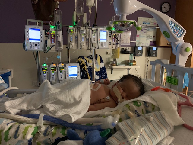 Baby Vincent in NICU bed.