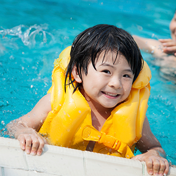 girl swimming with life jacket girl swimming with life jacket