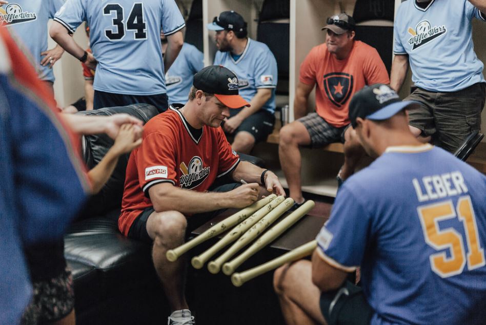 Players signing bats