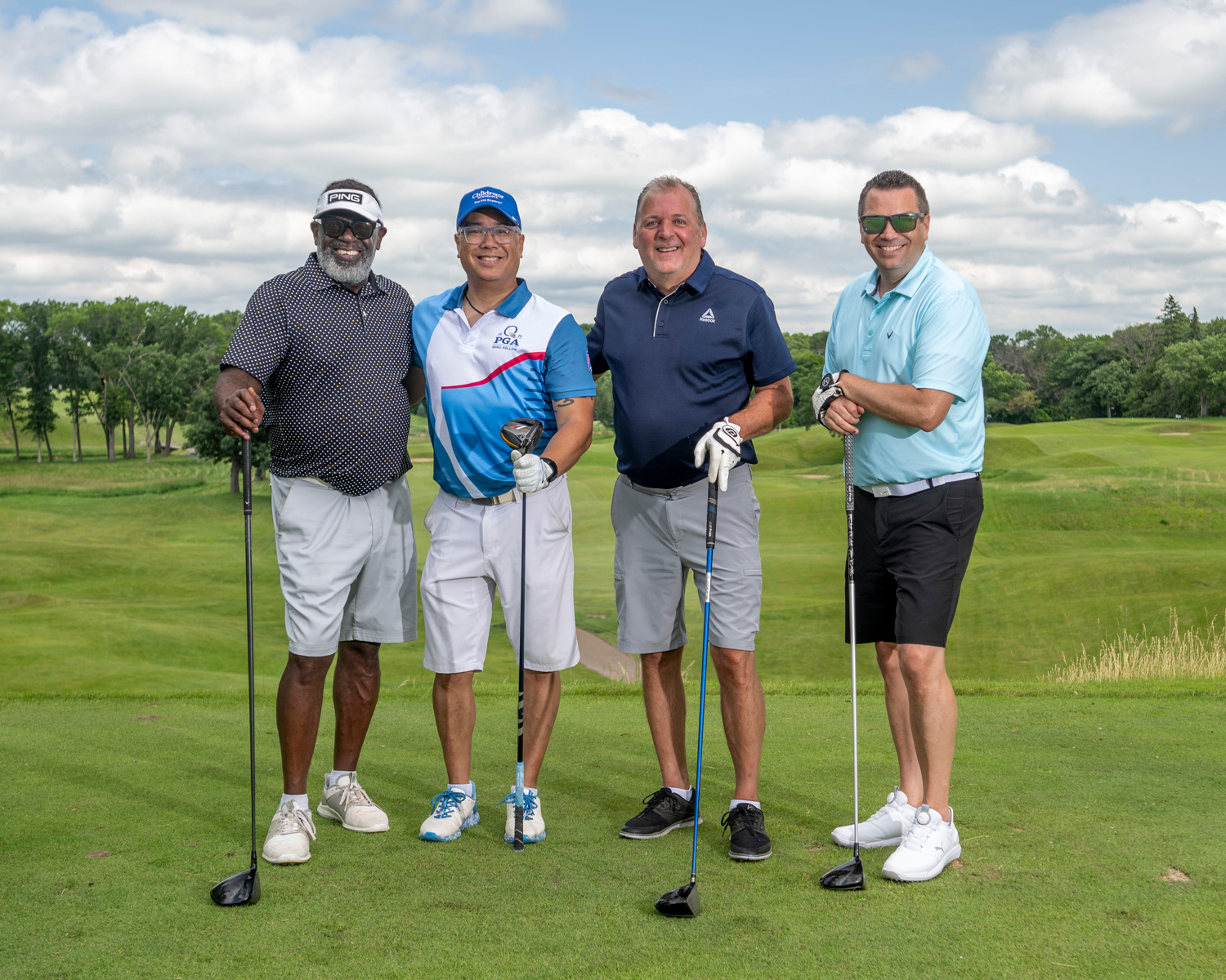 Team of 4 golfers at Golf Benefit event